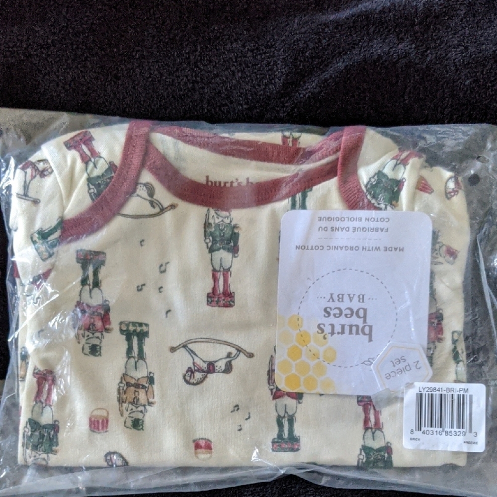 Burt's Bees Baby Cream Romper with Red Trim and Nutcracker Print